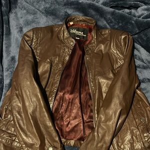 Vintage Wilson suede and leather jacket. Tiny hole on inner sleeve.